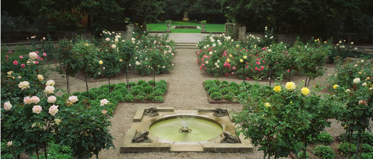 View of the rose garden and central fountain featured in the Gardens and Recreation Guided Tour at Ford House.