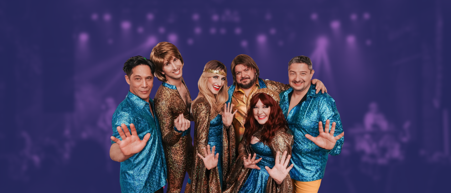 The cast of Dancing Queen: An ABBA Salute poses in sparkly gold and blue disco costumes with raised jazz hands against a purple concert-style background, promoting the outdoor tribute concert at Ford House.