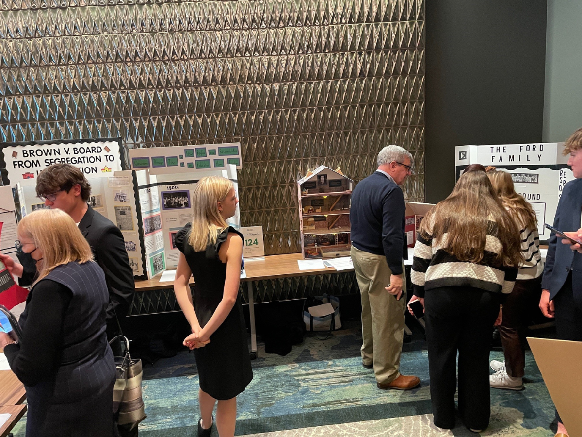 Students presenting projects and displays during Grosse Pointe History Day hosted at Ford House.