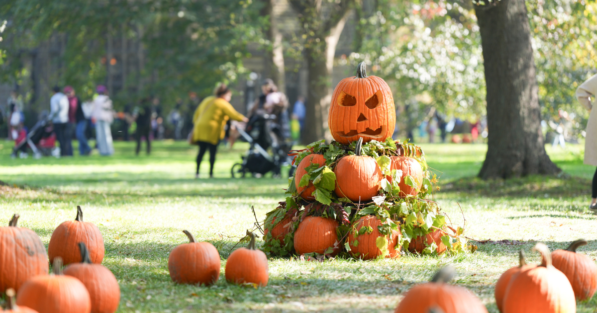 A pumpkin tower centerpiece stands tall in the lawn during the Little Goblins Halloween event at Ford House.