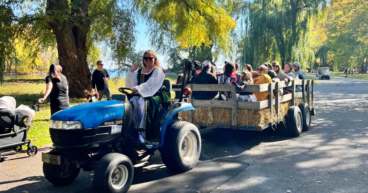 A costumed driver pulls a wagon of hayride guests through the grounds during Ford House’s Little Goblins.