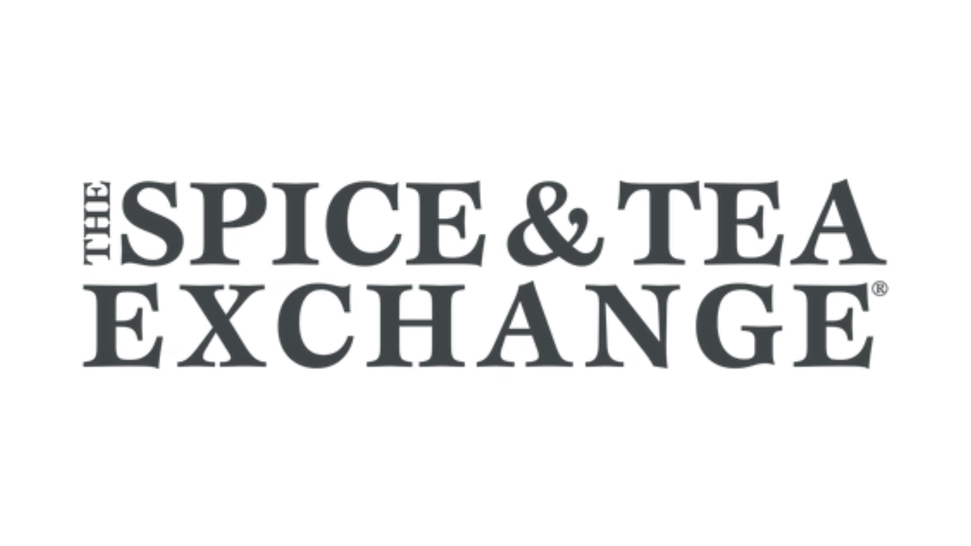 The Spice & Tea Exchange logo with elegant serif lettering in dark gray, featuring the words 'The Spice & Tea Exchange' stacked on a white background.